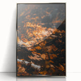 Mid-century modernist art depicting autumn trees in orange and brown tones on a framed acrylic print.