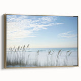 Framed canvas artwork showcasing a vibrant beach landscape with golden accents, highlighting tranquil ocean waves and a serene atmosphere, perfect for home decor.