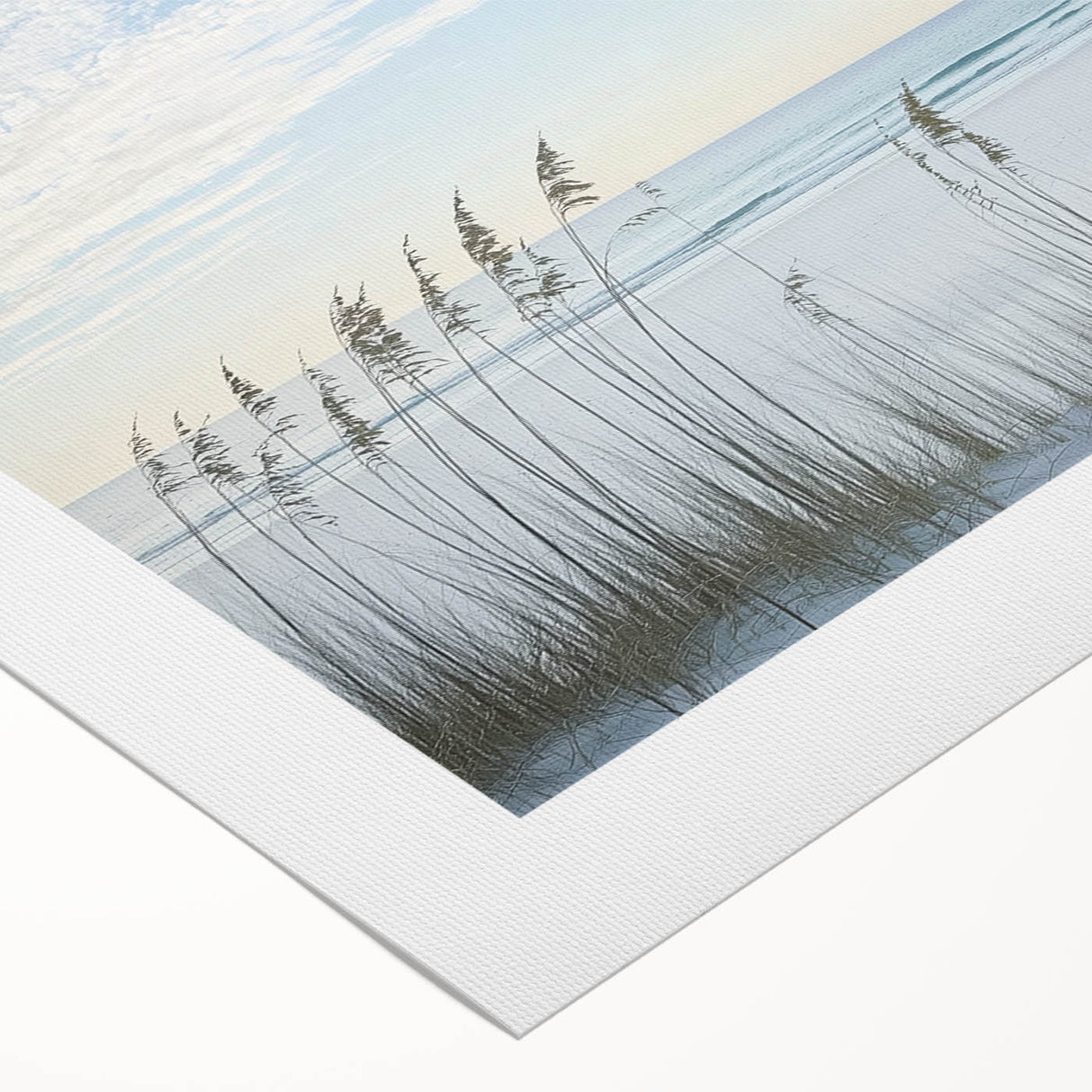 Rolled canvas artwork showcasing a serene beach landscape with vibrant colors, ideal for home decor. Packaged securely in a protective cardboard tube for shipping.