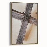 Framed canvas of a vintage-style landscape painting featuring spring season in muted earth tones.