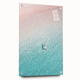 Large abstract wall art on acrylic glass showcasing swirling blue and green patterns.