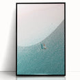 Large abstract wall art featuring swirling blue and white patterns on a black acrylic print.