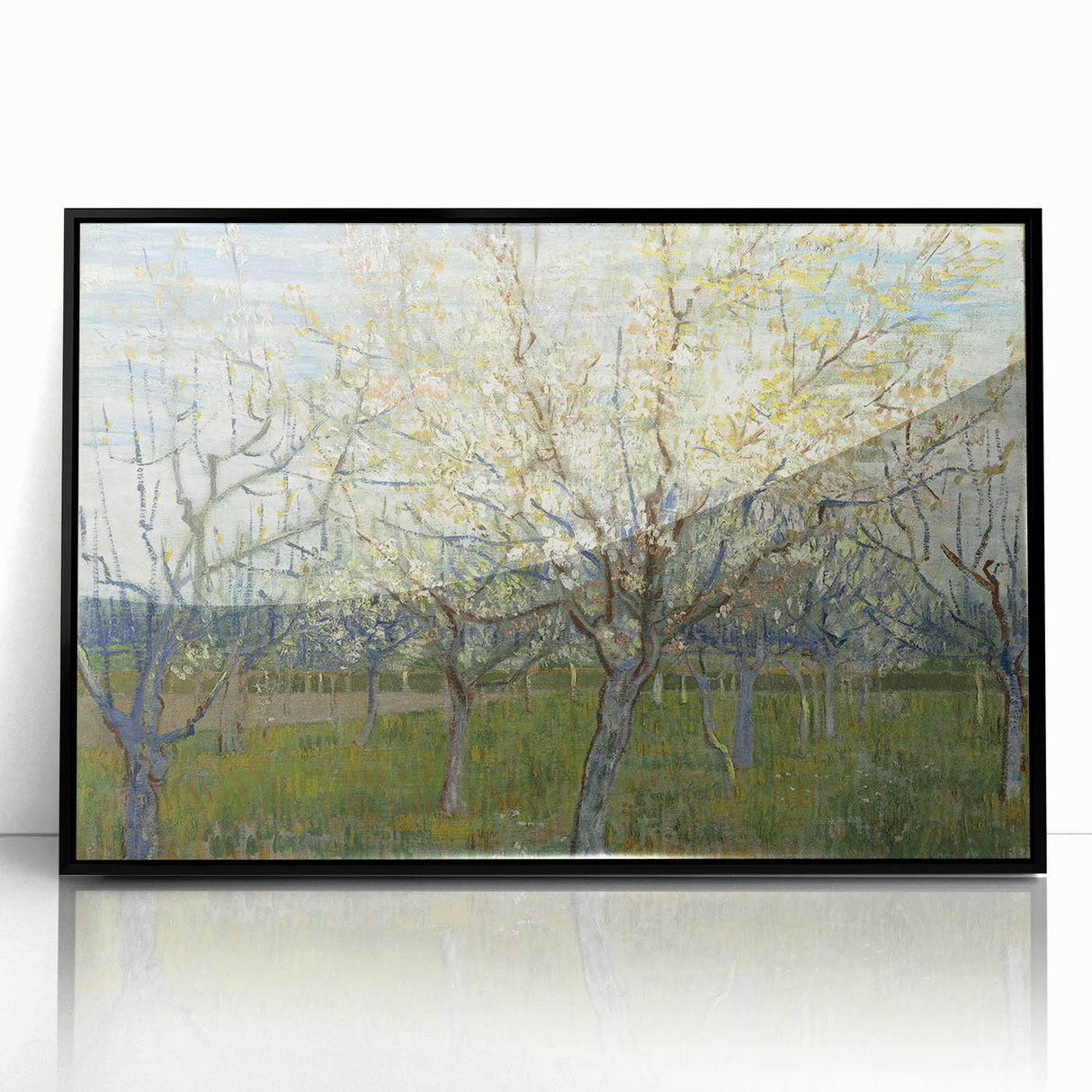 Large abstract wall art featuring swirling blue and yellow patterns on a black framed acrylic.