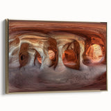 Framed canvas artwork depicting a stunning landscape scene with intricate cave formations, elegantly finished with a gold frame, ideal for modern home decor.