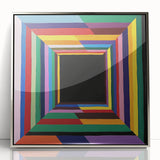 Framed acrylic artwork showcasing an abstract geometric design in silver tones, with sharp angles and smooth finishes, perfect for modern home decor.