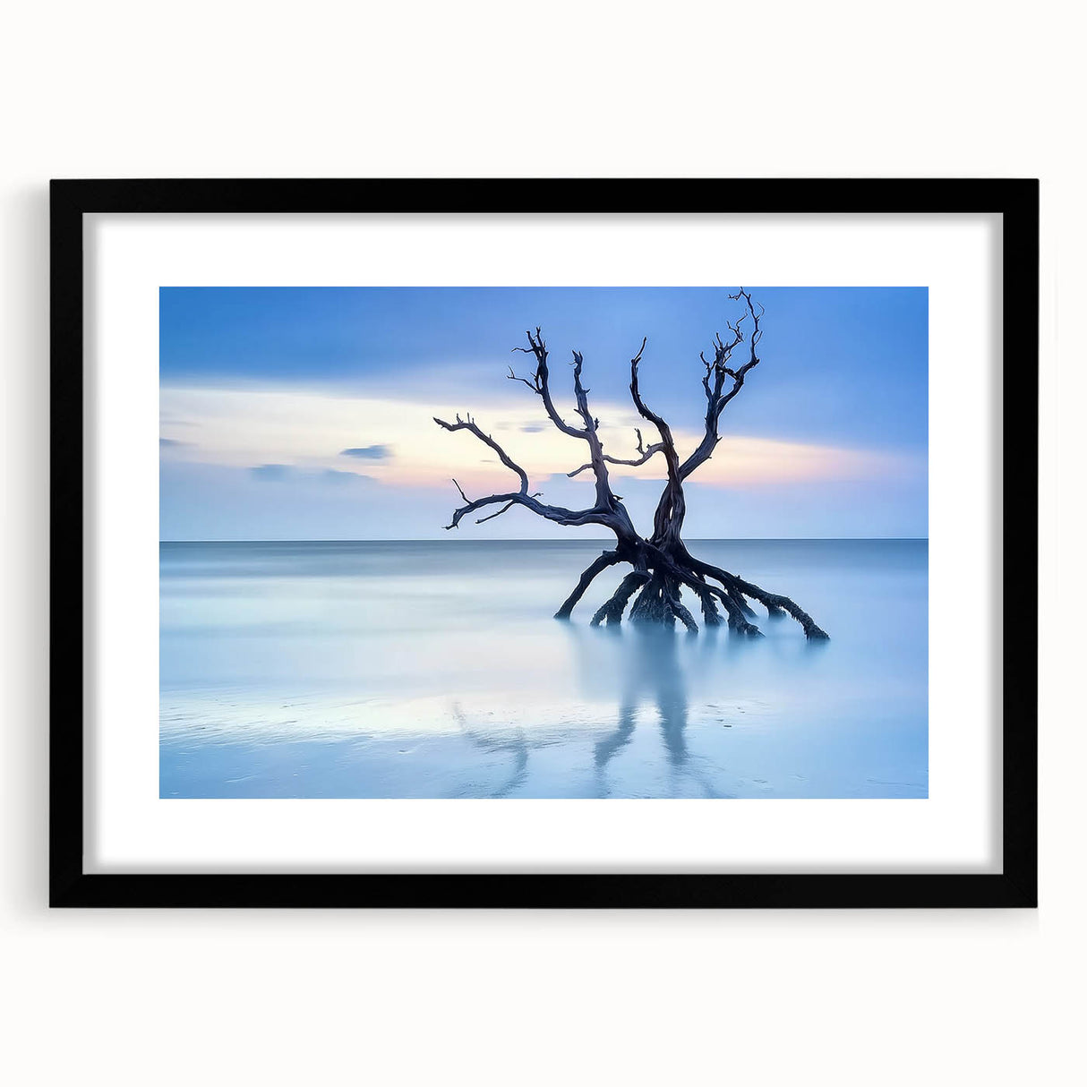 Framed landscape artwork depicting serene beaches, featuring a black mat and a sleek black frame, ideal for enhancing modern home decor with coastal vibes.