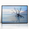 Framed acrylic artwork showcasing a serene beach landscape with vibrant colors, black frame accentuating the scene, perfect for coastal home decor.