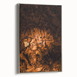Framed canvas depicting a vintage landscape painting with colorful autumn trees against a black background.