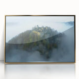 Framed acrylic artwork showcasing a majestic castle landscape with gold accents, ideal for home decor. The piece highlights intricate details and vibrant colors, enhancing any interior space.