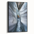 Framed canvas artwork depicting a stunning cave landscape with rich textures and deep colors, featuring a sleek black frame, perfect for enhancing modern home decor.