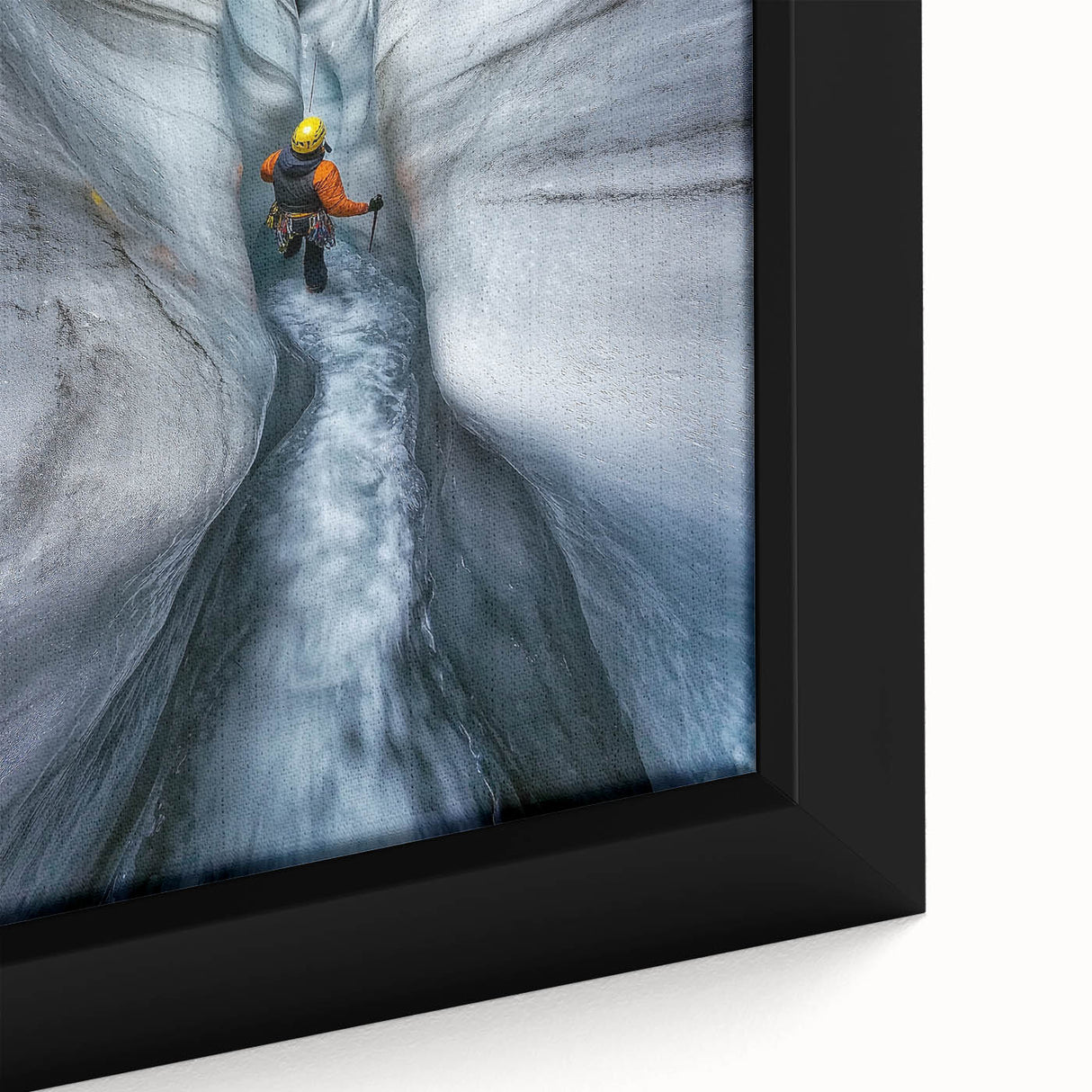 Close-up of a framed canvas depicting vibrant landscapes with intricate cave formations, showcasing earthy tones and textures, perfect for home decor enhancement.