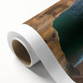 Vibrant rolled canvas artwork showcasing a breathtaking landscape of rugged cliffs and serene ocean waves, perfect for enhancing home decor with natural beauty.