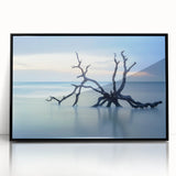 Framed acrylic art piece showcasing a stunning beach landscape with vibrant colors, ideal for coastal decor. The black frame enhances the serene seaside scene.