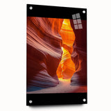 Acrylic glass artwork showcasing a vibrant desert landscape in rich colors, displayed at an angle with visible mounting pins, perfect for modern home decor.