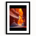 Desert landscape artwork framed in black with a white mat, showcasing vibrant hues of orange and yellow, perfect for modern home decor.