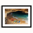 Framed landscape art print showcasing dramatic cliffs against a serene sky, featuring a sleek black frame with a white mat, perfect for home decor.