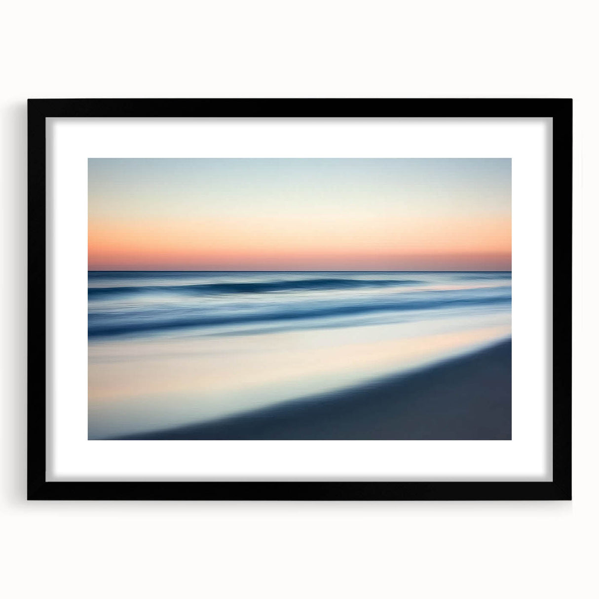 Stylish black-framed landscape artwork showcasing serene beach scenery with vibrant blue waters and golden sand, perfect for coastal-themed decor.