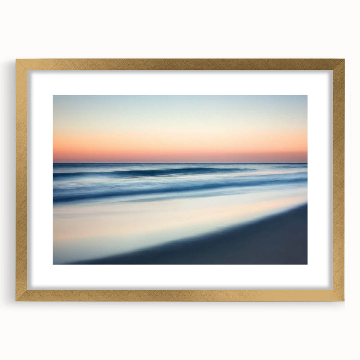 Framed landscape artwork showcasing a serene beach scene with soft waves and golden matting, ideal for home decor and coastal-themed interiors.
