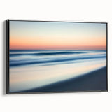 Framed canvas art showcasing a serene beach landscape with vibrant colors, presented in a sleek black frame, ideal for home decor and coastal-themed interiors.
