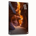 Desert landscape acrylic glass art showcasing warm tones of orange and gold, beautifully framed with pins for a modern touch, ideal for home decor.