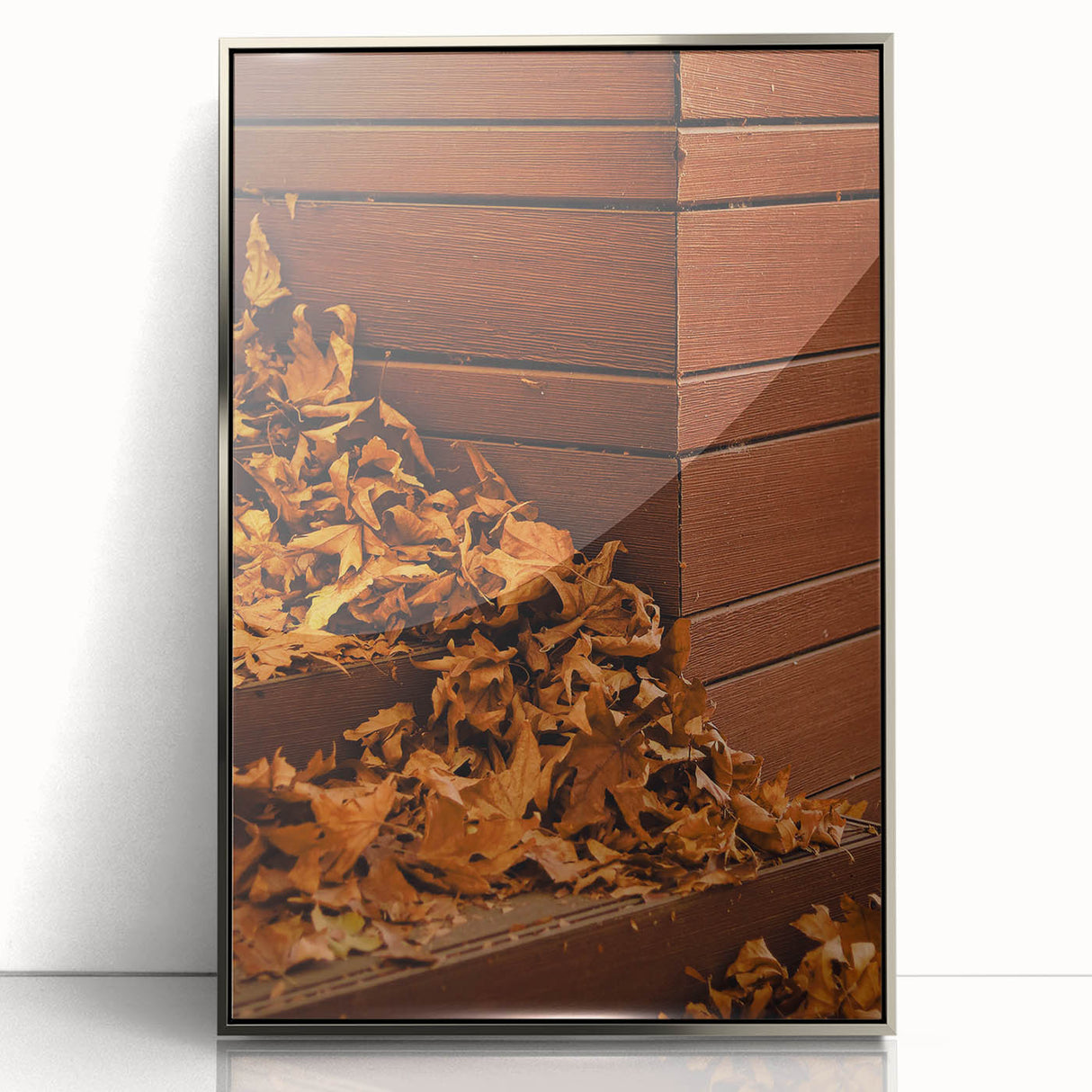 Mid-century modernist art depicting an autumn scene in pastel shades, framed in silver acrylic.