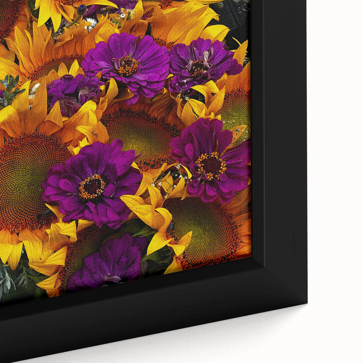 Close-up of a large framed canvas featuring textured black wall art with vibrant, colorful abstract designs.
