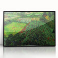Framed acrylic print of a large abstract wall art piece featuring swirling blue and yellow patterns.