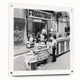 Large abstract wall art on acrylic glass depicting vibrant food and people scenes, ideal for dining room decor.