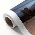 Art deco poster of an Algerian landscape on rolled canvas, featuring muted earth tones, ideal for nursery wall art.
