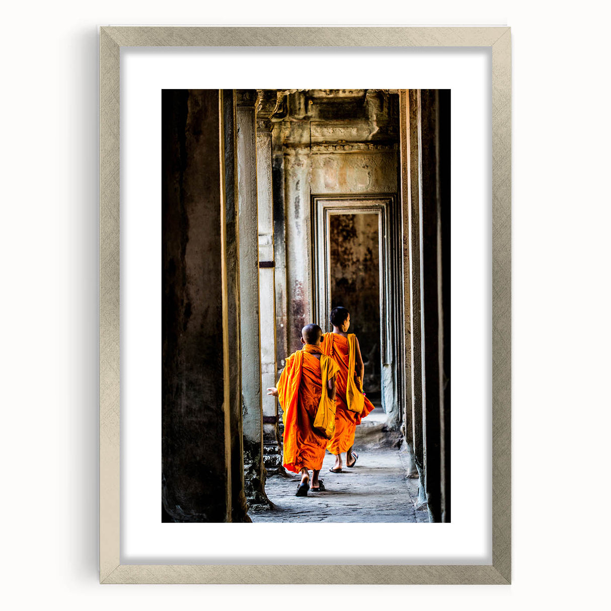 Textured art depicting an abstract Cambodian landscape in earth tones, framed in silver, ideal for bedroom art.