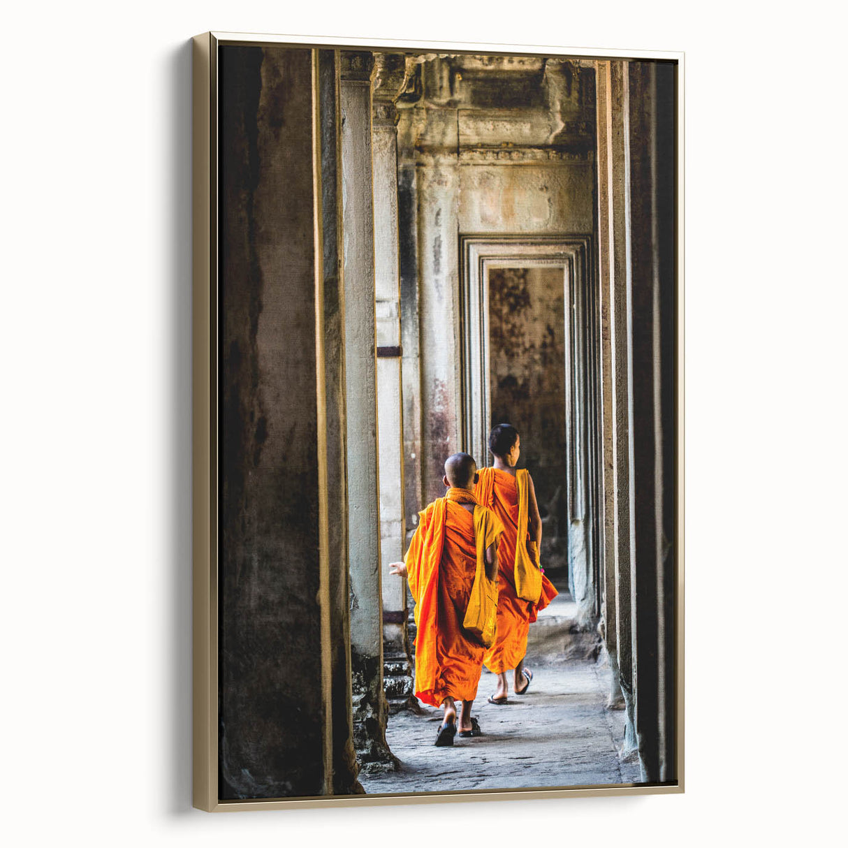 Framed canvas featuring a vintage-style landscape painting of a Cambodian scenery in black and gold tones.