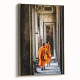 Framed canvas featuring a vintage-style landscape painting of a Cambodian scenery in black and gold tones.