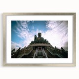 Textured art of Hong Kong skyline in abstract style, using muted gray and blue tones on a framed print with silver mat.