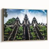 Framed canvas landscape painting of an Indonesian scenery in vintage style, with gold and black tones.