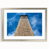 Textured abstract art print depicting a serene Sri Lankan landscape in muted earth tones, framed with a silver mat.