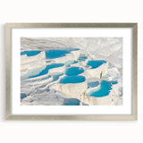 Textured abstract art print of a Turkish landscape in muted earth tones, framed in silver, ideal for bedroom art.