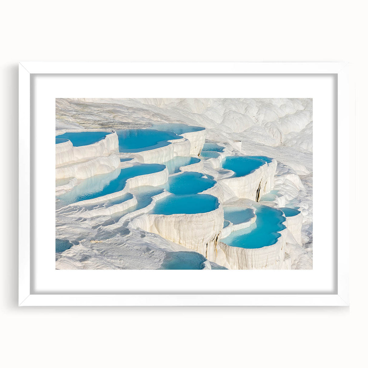 Abstract art print of a Turkish landscape in muted earth tones on a framed white mat, suitable for dining room decor.