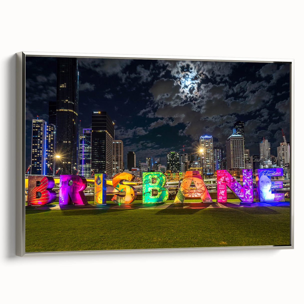 Vintage poster art of Brisbane scenery on a silver-framed canvas, featuring vibrant colors, ideal for living room decor.