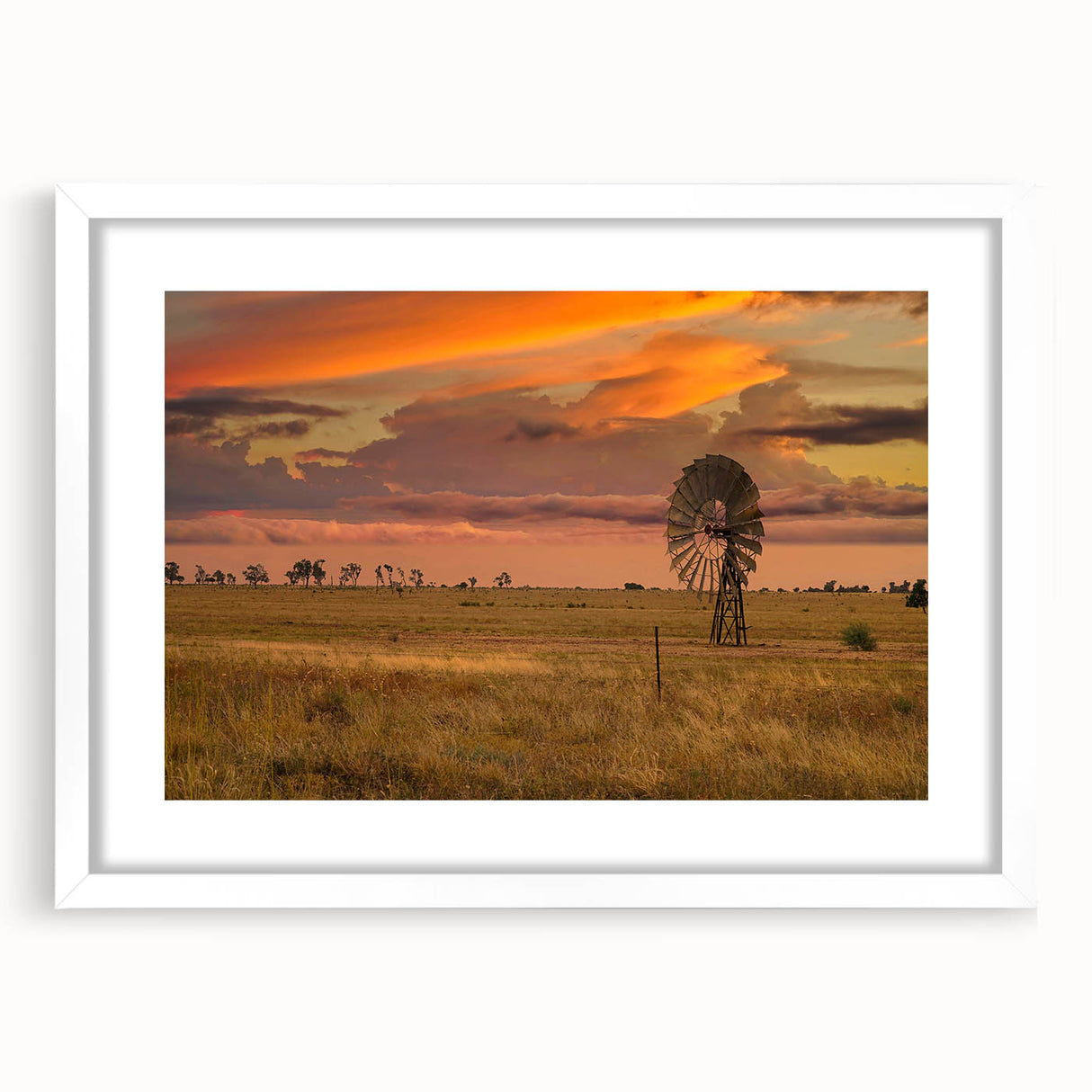 Textured abstract art print depicting a serene Queensland scenery in muted earth tones, framed in white.