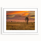 Textured abstract art print depicting a serene Queensland scenery in muted earth tones, framed in white.