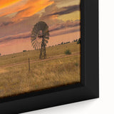 Close-up of a textured black wall art depicting Queensland scenery on a framed canvas, featuring vibrant colors.