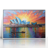 Acrylic print of Sydney skyline in muted blue tones, framed in white, suitable for modern nursery decor.