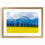 Extra large textured abstract art print of Alberta scenery in a gold frame, ideal for living room decor.