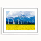 Abstract art print of Alberta scenery in muted earth tones on a framed white mat, ideal for dining room decor.