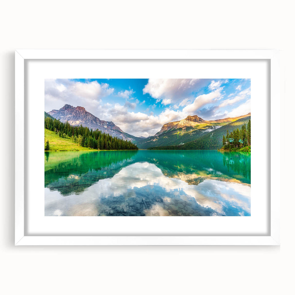Abstract art print depicting a serene British Columbia landscape in muted green and blue tones on a framed white mat.