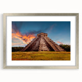 Textured abstract art print depicting a Central American scenery in muted earth tones, framed in silver.