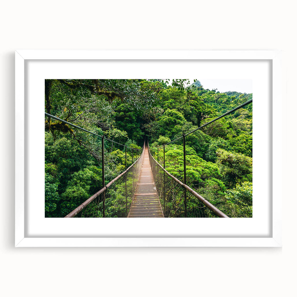 Abstract art print of a vibrant Costa Rican landscape in a white frame, ideal for dining room decor.