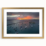 Abstract art print of Central America scenery in textured gold frame, ideal for living room decor.