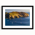Abstract art print of a colorful, textured Central American landscape on a large black-framed canvas.