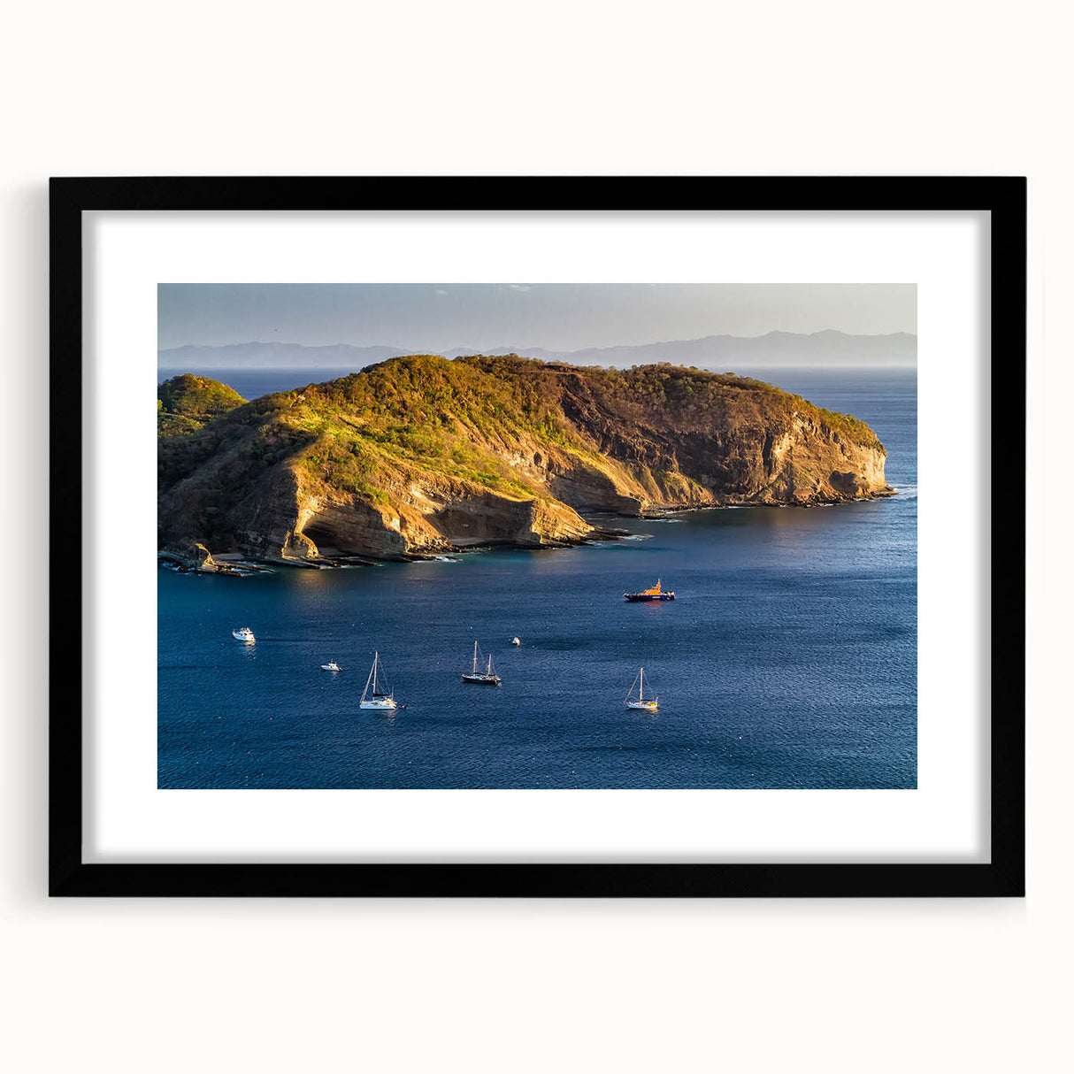 Abstract art print of a colorful, textured Central American landscape on a large black-framed canvas.
